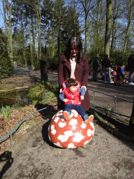 Miaomiao and Max on a mushroom statue at the Fairytale Forest at the Marerijk kingdom