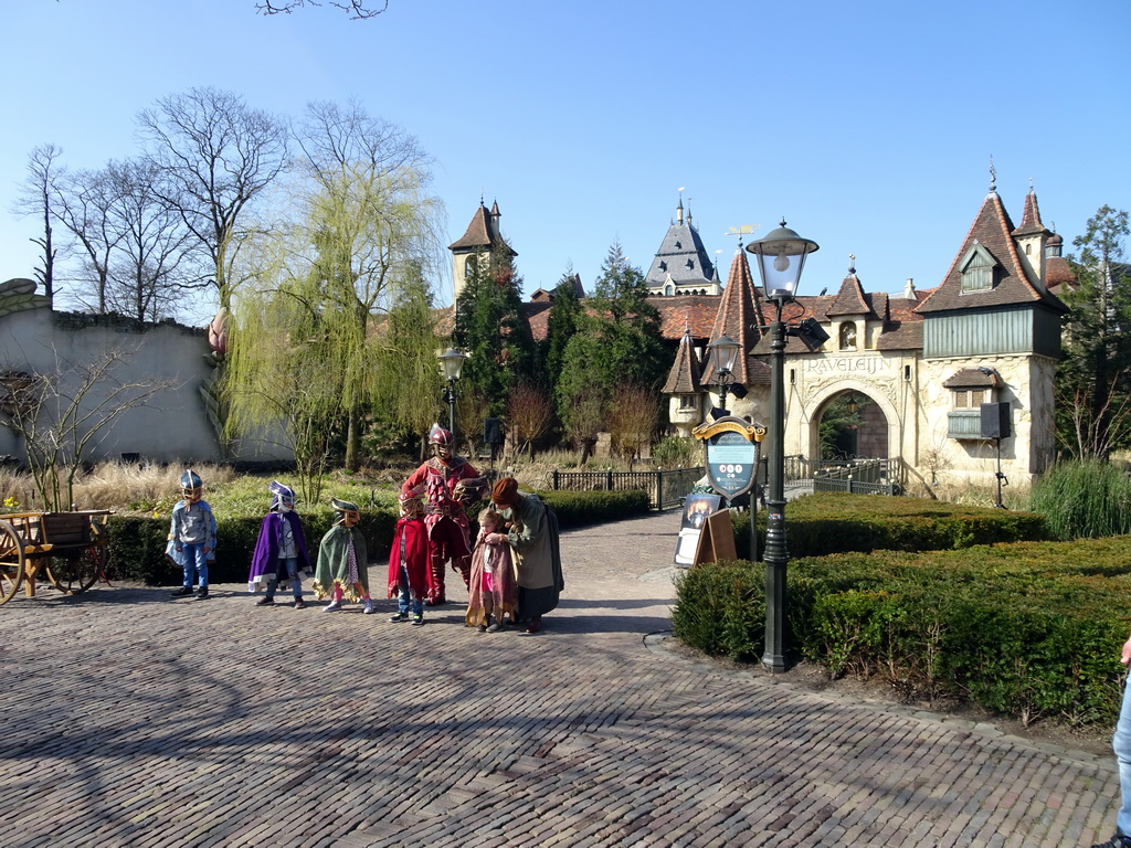 Actors and children at the Ton van de Ven square in front of the Raveleijn theatre at the Marerijk kingdom