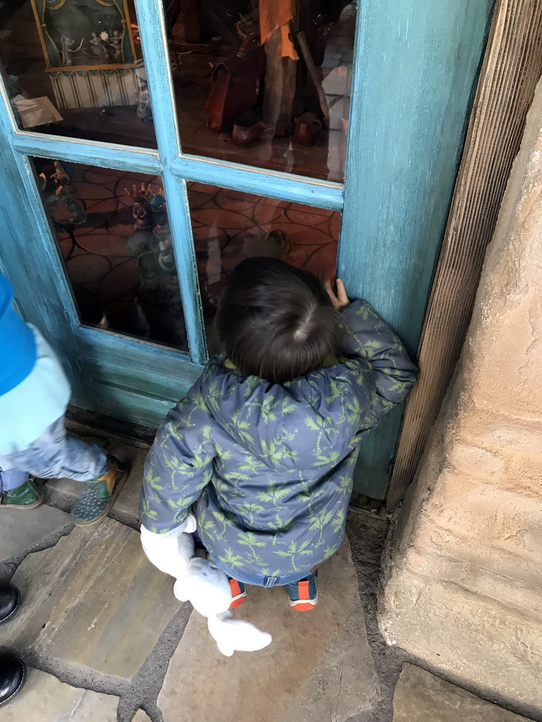 Max in front of Geppetto`s House at the Pinocchio attraction at the Fairytale Forest at the Marerijk kingdom