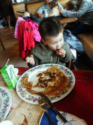 Max having a pancake at the Polles Keuken restaurant at the Fantasierijk kingdom