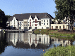 The Aquanura lake at the Anderrijk kingdom and the Efteling Theatre at the Fantasierijk kingdom