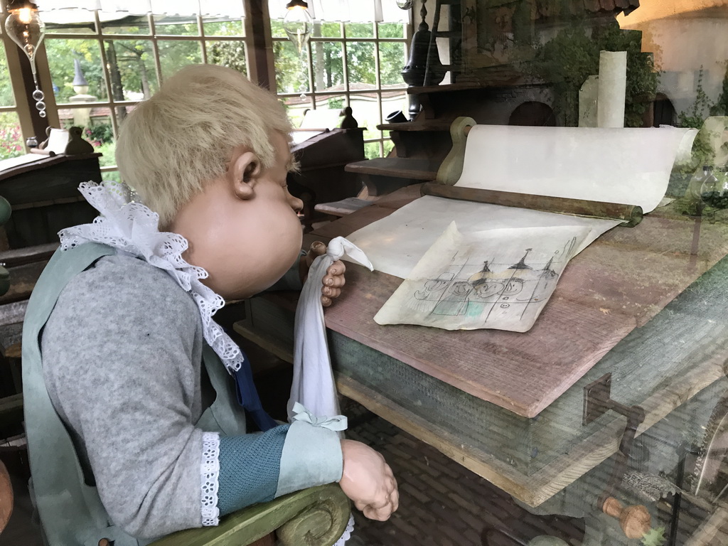 Laaf writing in the Leerhuys building at the Laafland attraction at the Marerijk kingdom