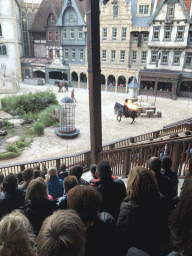 Actors and horses on the stage of the Raveleijn theatre at the Marerijk kingdom, during the Raveleijn Parkshow