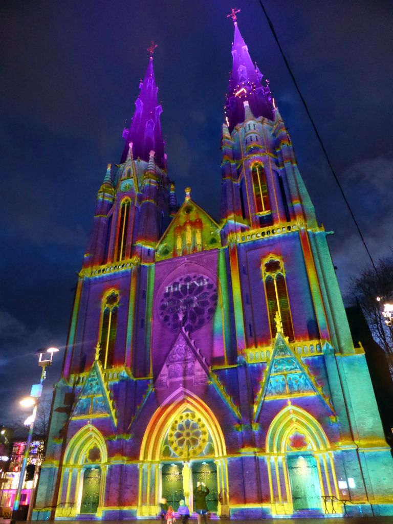 Facade of the St. Catharina Church at the Catharinaplein square during the GLOW festival, by night