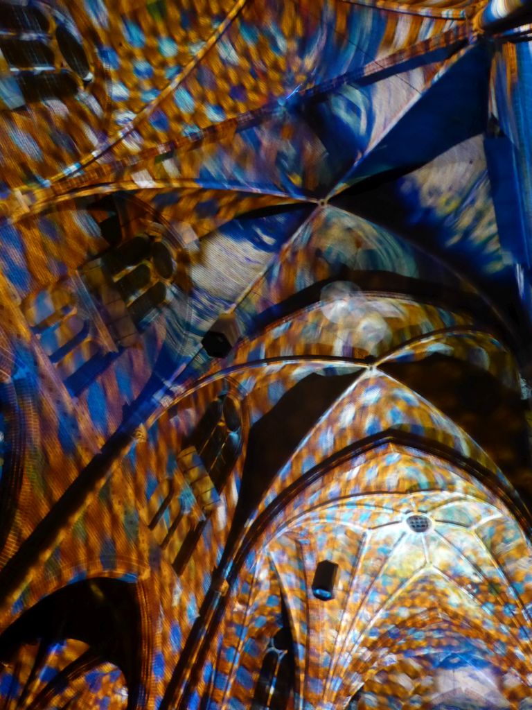 Ceiling of the nave of the Augustijnenkerk church during the Casa Magica lightshow of the GLOW festival