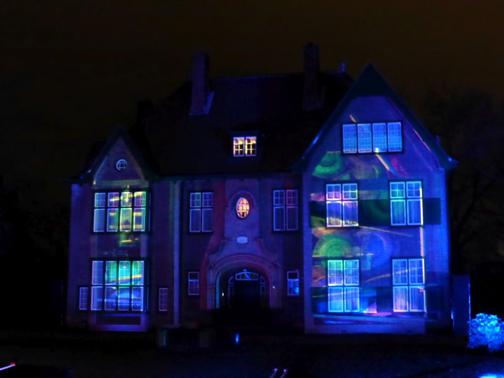 Light show `Parklaan Flashback` on the Villa Granville building at the Parklaan street during the GLOW festival, by night