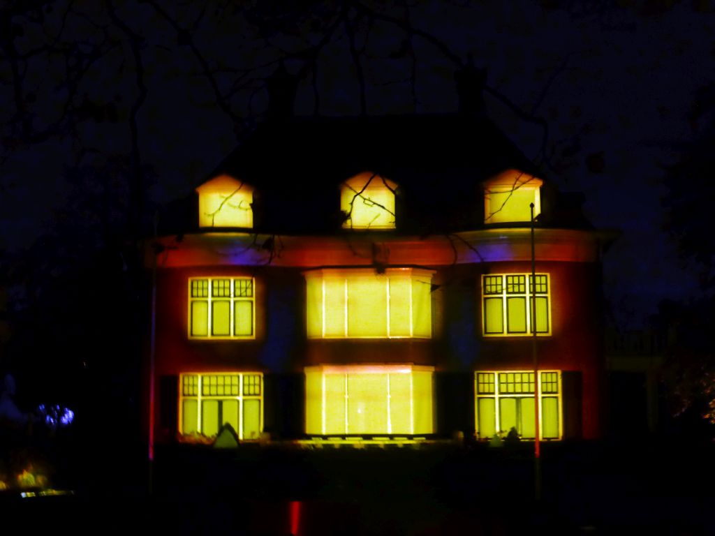 Light show `Parklaan Flashback` on the Villa Wijers building at the Parklaan street during the GLOW festival, by night