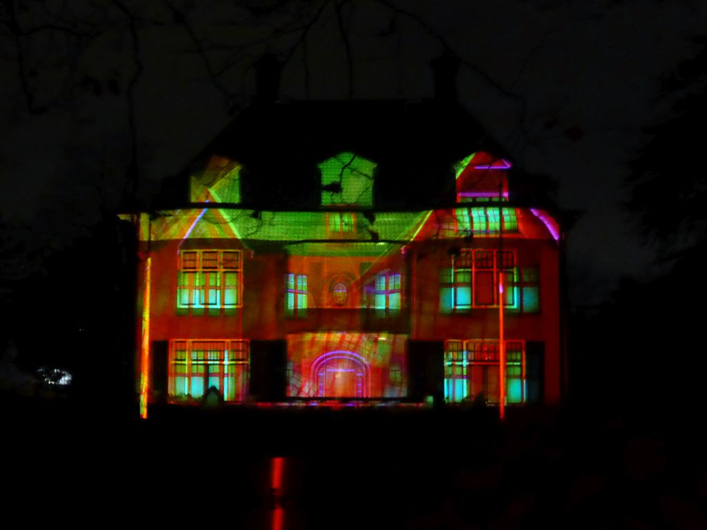 Light show `Parklaan Flashback` on the Villa Wijers building at the Parklaan street during the GLOW festival, by night