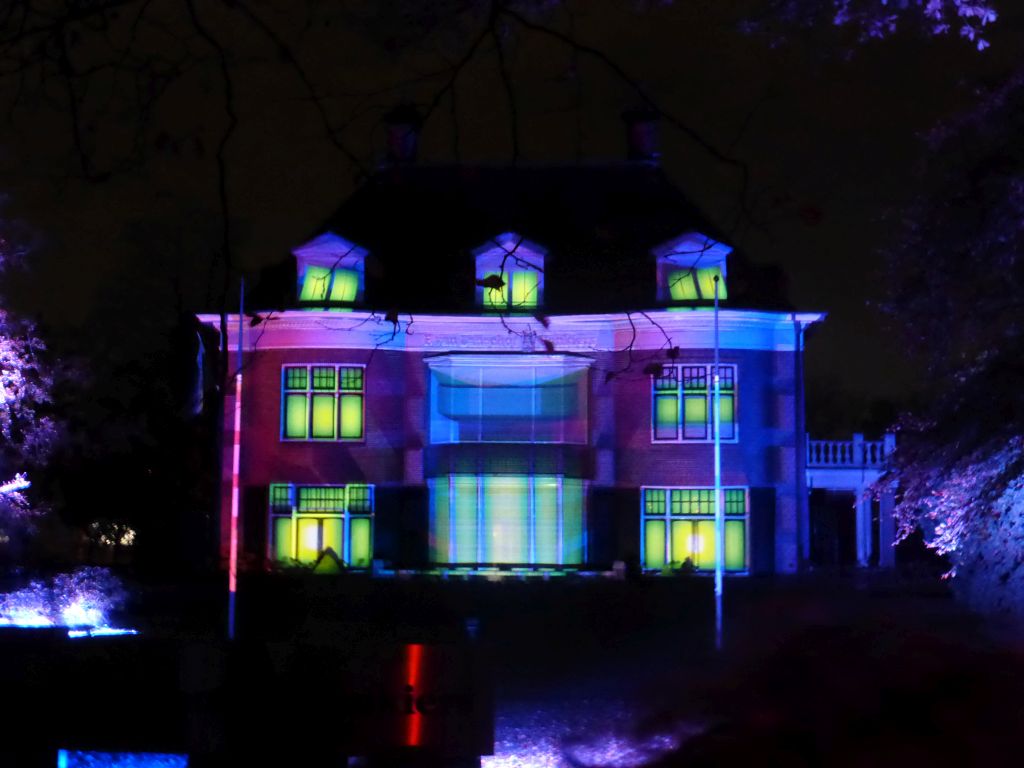 Light show `Parklaan Flashback` on the Villa Wijers building at the Parklaan street during the GLOW festival, by night