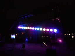 Light sculpture `Large Pendulum Wave` at the street at the southeast side of the railway station during the GLOW festival, by night