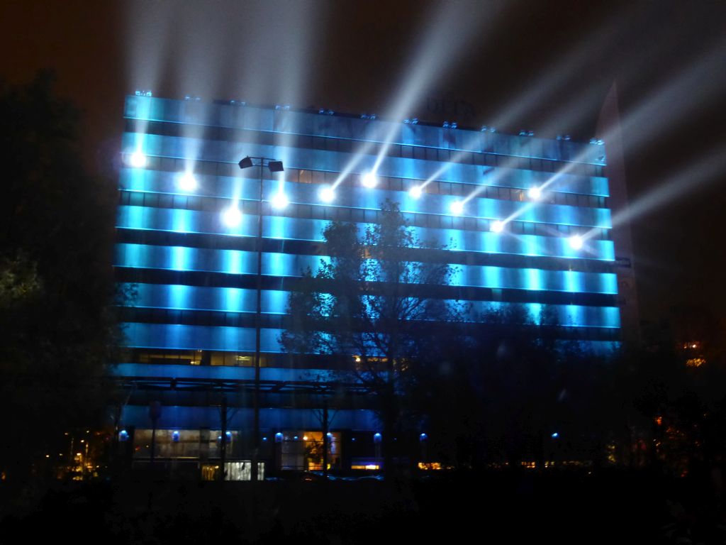 Light sculpture `Statemachine` on the DELA building during the GLOW festival, viewed from the Bleekweg street, by night