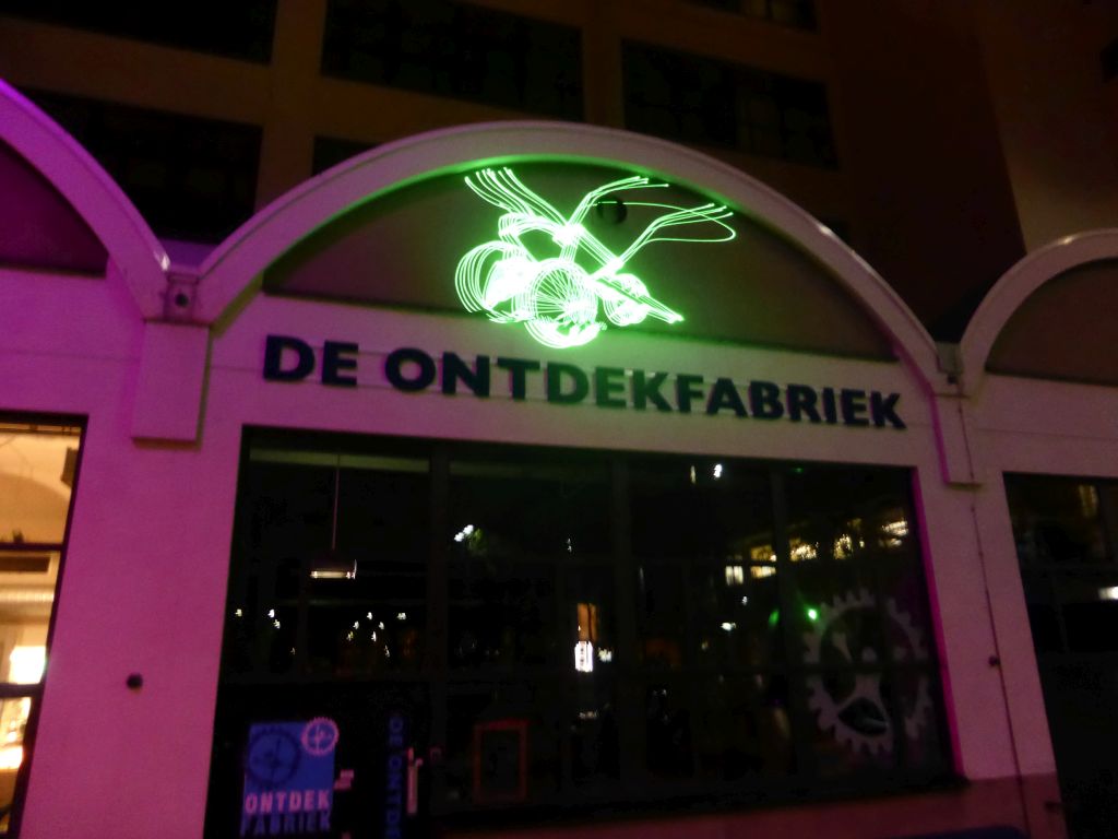 Projection at the front of the Ontdekfabriek building at the Torenallee street during the GLOW-NEXT festival, by night