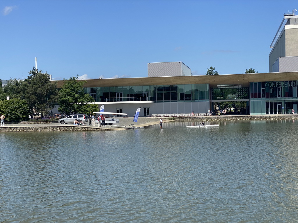 Boats on the pond at the High Tech Campus Eindhoven, with a view on the Strip area and buildings HTC33 and HTC34, during the High Tech Campus Eindhoven Open Day 2022