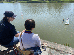 Miaomiao playing with a remote controlled boat at the pond at the High Tech Campus Eindhoven, during the High Tech Campus Eindhoven Open Day 2022