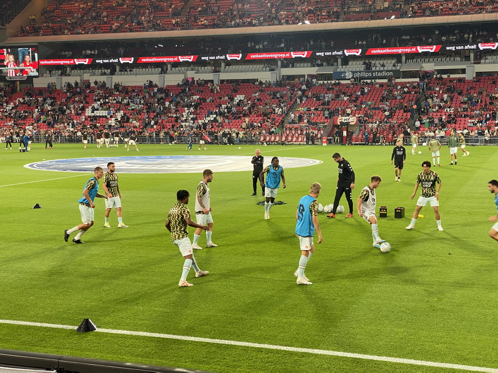 NEC players on the pitch at the Philips Stadium, viewed from the Eretribune Noord grandstand, just before the football match PSV - NEC