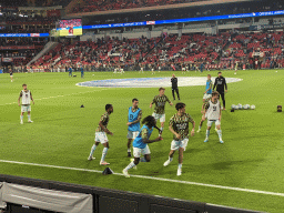 NEC players on the pitch at the Philips Stadium, viewed from the Eretribune Noord grandstand, just before the football match PSV - NEC