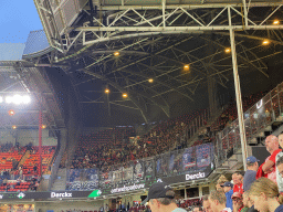 NEC fans at the away grandstand at the Philips Stadium, viewed from the Eretribune Noord grandstand, just before the football match PSV - NEC