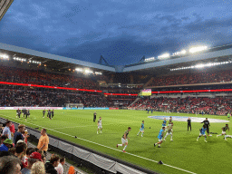 Players on the pitch at the Philips Stadium, viewed from the Eretribune Noord grandstand, just before the football match PSV - NEC