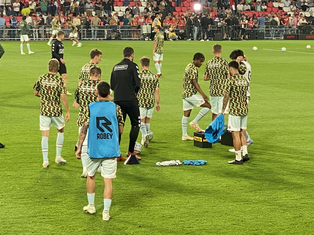 NEC players on the pitch at the Philips Stadium, viewed from the Eretribune Noord grandstand, just before the football match PSV - NEC