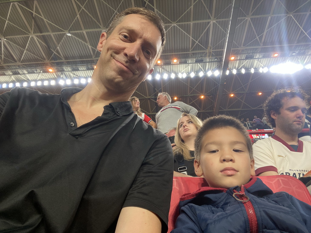 Tim and Max on the Eretribune Noord grandstand at the Philips Stadium, just before the football match PSV - NEC