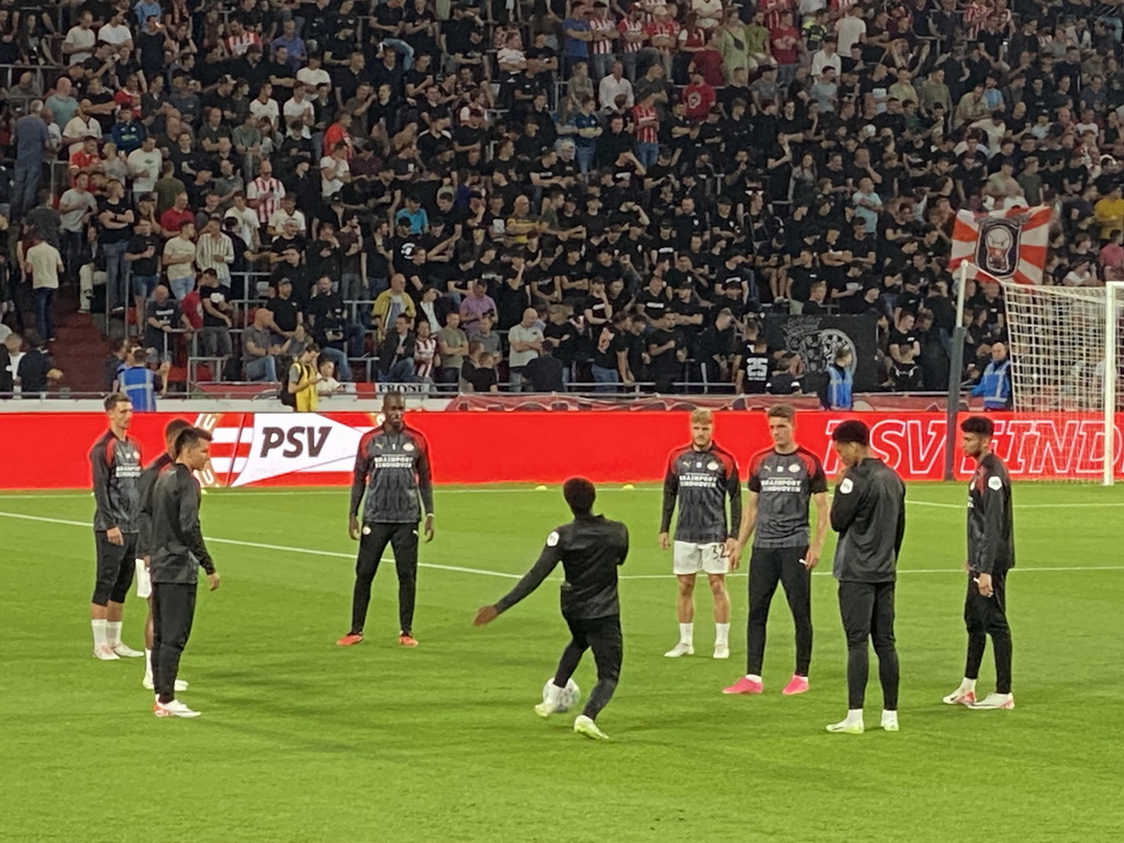 PSV players on the pitch at the Philips Stadium, viewed from the Eretribune Noord grandstand, just before the football match PSV - NEC