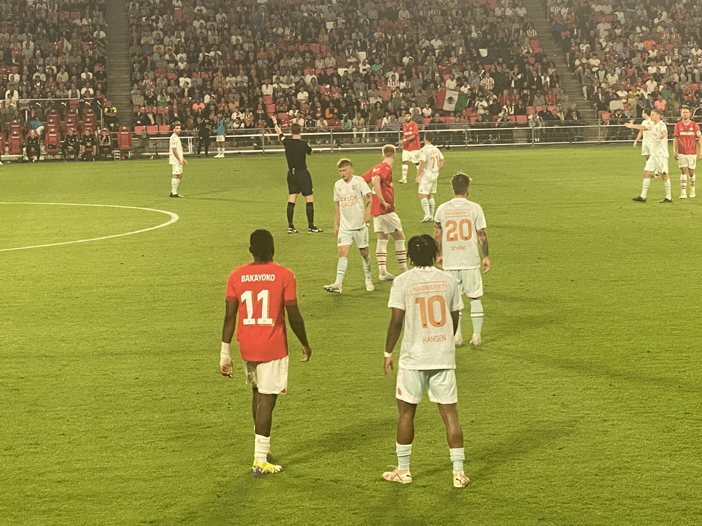 PSV player Noa Lang being substituted by Hirving Lozano at the Philips Stadium, viewed from the Eretribune Noord grandstand, during the football match PSV - NEC