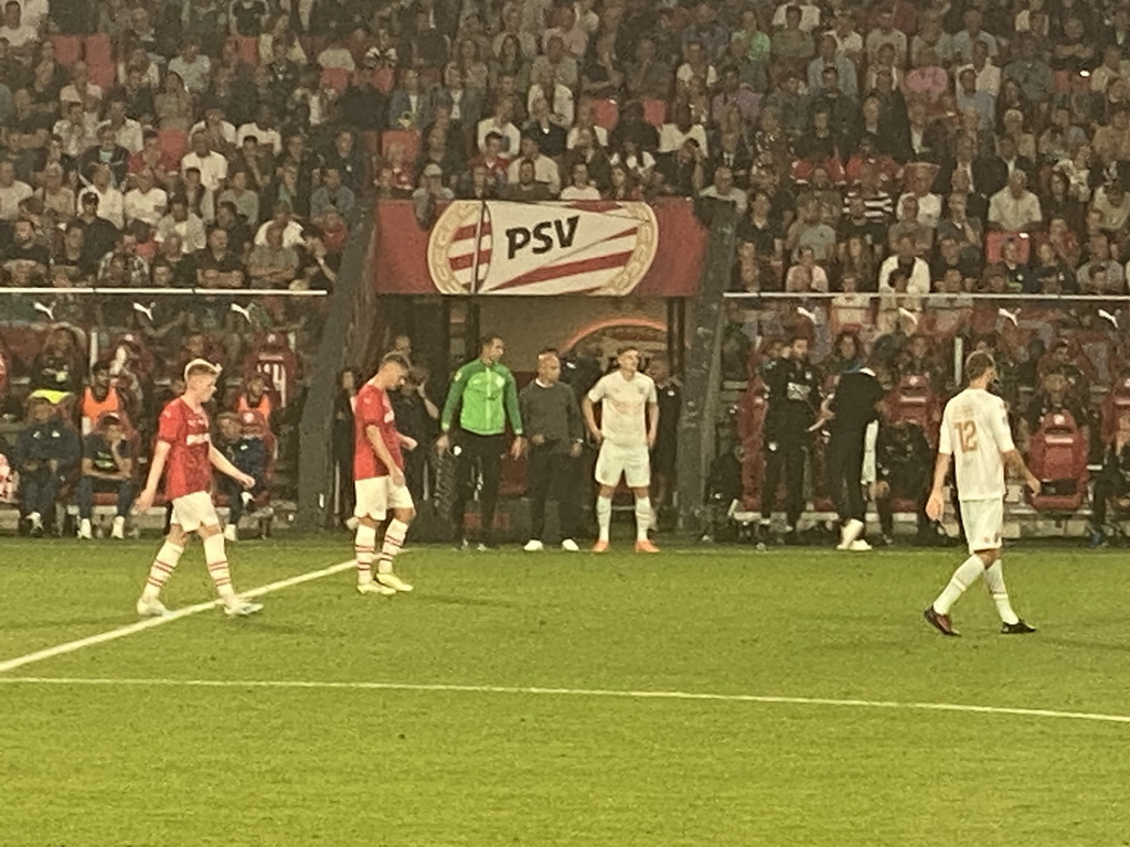 NEC players Koki Ogawa and Lasse Schöne being substituted by Bas Dost and Mees Hoedemakers at the Philips Stadium, viewed from the Eretribune Noord grandstand, during the football match PSV - NEC