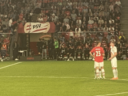 Referee looking at the VAR screen at the Philips Stadium, viewed from the Eretribune Noord grandstand, during the football match PSV - NEC