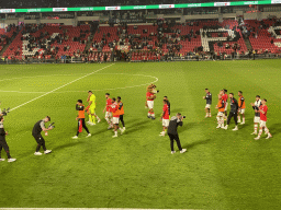 PSV players on the pitch thanking the crowd at the Philips Stadium, viewed from the Eretribune Noord grandstand, right after the football match PSV - NEC