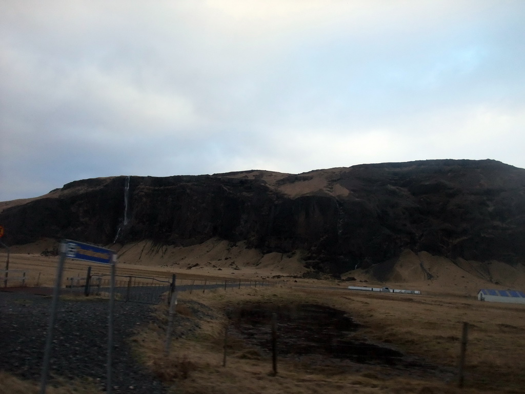Waterfall on the southwest side of the Eyjafjallajökull volcano, viewed from the rental car to Reykjavik