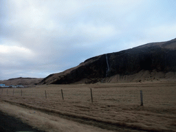 Waterfall on the southwest side of the Eyjafjallajökull volcano, viewed from the rental car to Reykjavik