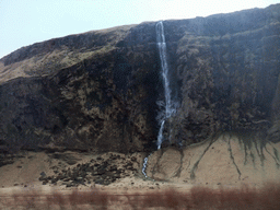 Waterfall on the southwest side of the Eyjafjallajökull volcano, viewed from the rental car to Reykjavik