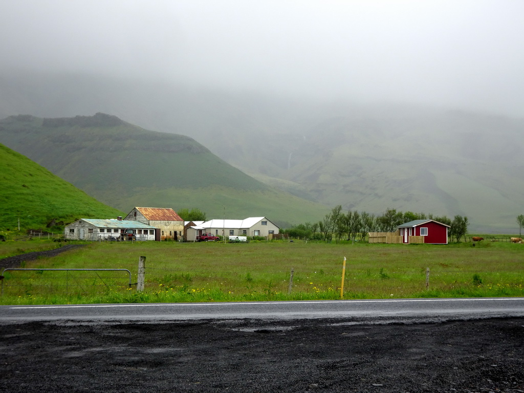 The Nupakot farm and the Eyjafjallajökull volcano, viewed from the parking lot of the Þorvaldseyri visitor centre