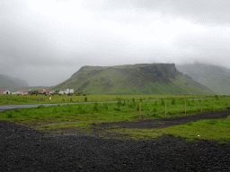 The Þorvaldseyri farm and a mountain on the southeast side of the Eyjafjallajökull volcano, viewed from the parking lot of the Þorvaldseyri visitor centre