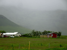 The Nupakot farm and the Eyjafjallajökull volcano, viewed from the parking lot of the Þorvaldseyri visitor centre