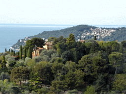 The Mont Boron hill and part of the town of Villefranche-sur-Mer, viewed from a parking place along the Avenue Belle Vista road from Nice