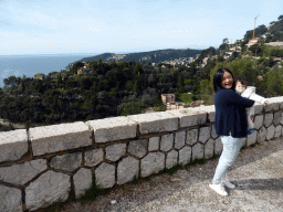 Miaomiao and Max at a a parking place along the Avenue Belle Vista road from Nice, with a view on the Mont Boron hill and part of the town of Villefranche-sur-Mer