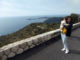 Miaomiao and Max at a parking place along the Moyenne Corniche road from Nice, with a view on the east side of the Cap-Ferrat peninsula