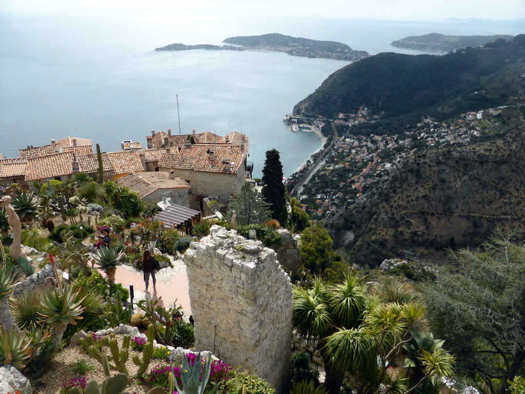 The Jardin d`Èze botanical garden, houses at the southwest side of town, the town of Èze-sur-Mer, the Mont Boron hill and the Cap-Ferrat peninsula with the town of Saint-Jean-Cap-Ferrat