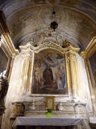 Altar and painting in a side chapel of the Église Notre Dame de l`Assomption church