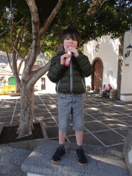 Max having an ice cream in front of the Iglesia de San José church at the Plaza de San José square
