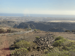 The town of Maspalomas and the south side of the Barranco de Fataga ravine, viewed from the tour bus on the GC-60 road