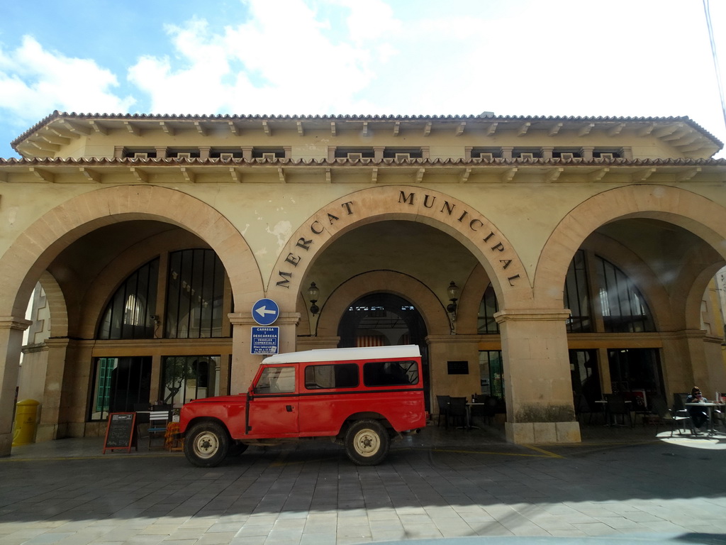 Front of the Mercat Municipal market at the Plaça Constitució square, viewed from the rental car