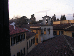 Roof of a church at the Via Romana street and houses at the Via Serumido street, viewed from Miaomiao`s room at the La Chicca di Boboli hotel