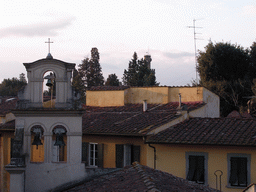 Roof of a church at the Via Romana street, the Torrigiani Tower and houses at the Via Serumido street, viewed from Miaomiao`s room at the La Chicca di Boboli hotel