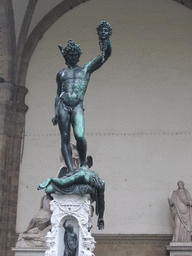 Statue `Perseus With the Head of Medusa` by Benvenuto Cellini in front of the Palazzo Vecchio palace at the Piazza della Signoria square