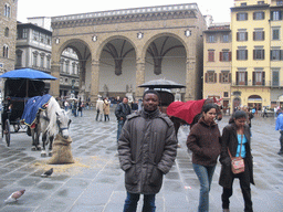 Miaomiao`s friend in front of the Loggia dei Lanzi at the Piazza della Signoria square
