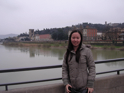 Miaomiao`s friend at the Ponte alle Grazie bridge, with a view on the Arno river, the Terzo Giardino garden, the San Niccolò Tower and the Chiesa di San Salvatore al Monte church