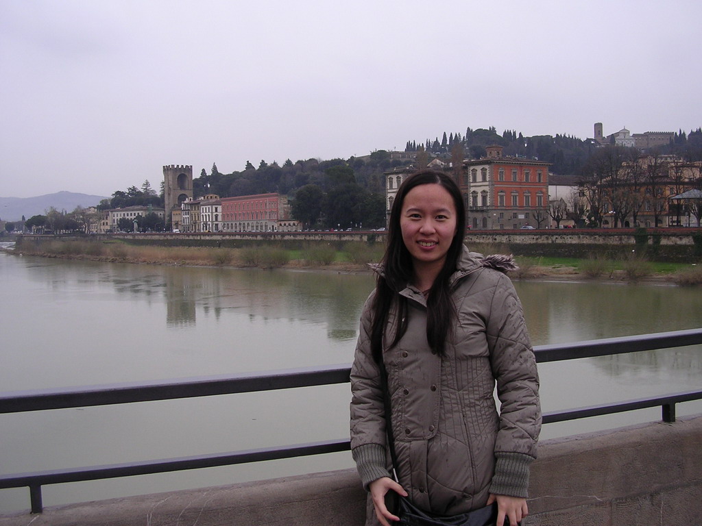 Miaomiao`s friend at the Ponte alle Grazie bridge, with a view on the Arno river, the Terzo Giardino garden, the San Niccolò Tower and the Chiesa di San Salvatore al Monte church