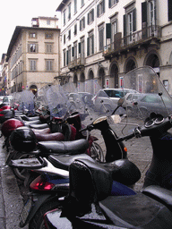 Scooters at the Via Giuseppe Verdi street